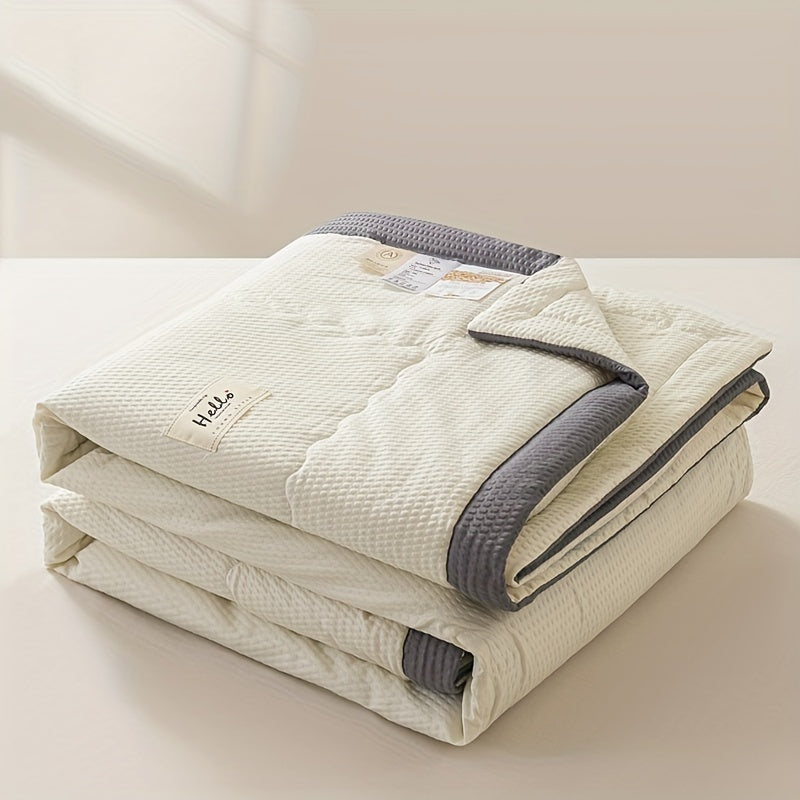 Ultra-soft lightweight summer quilt with cooling bean paste design for bedroom and guest room comfort, machine washable.