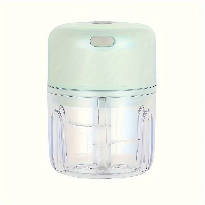 Compact electric mini food chopper with USB rechargeable battery, ideal for chopping garlic, vegetables, fruit, and meat.