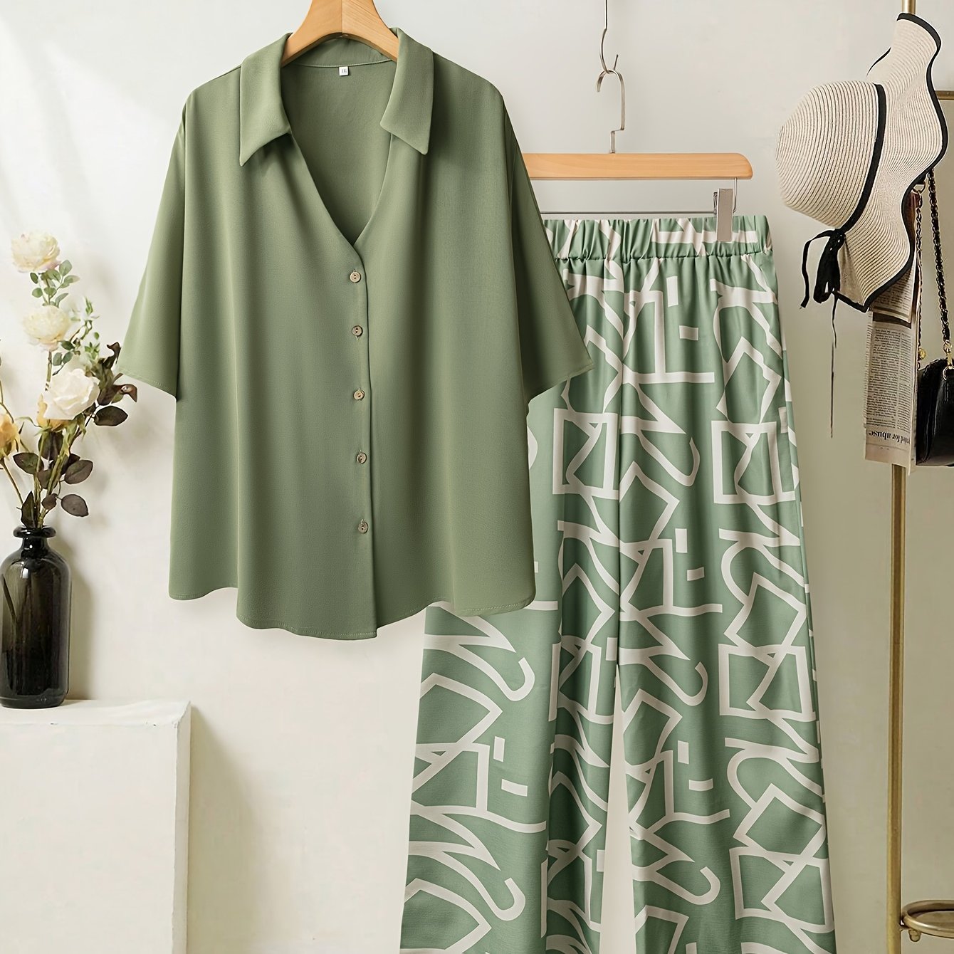 Women's large size elegant two-piece set - shirt and pants.