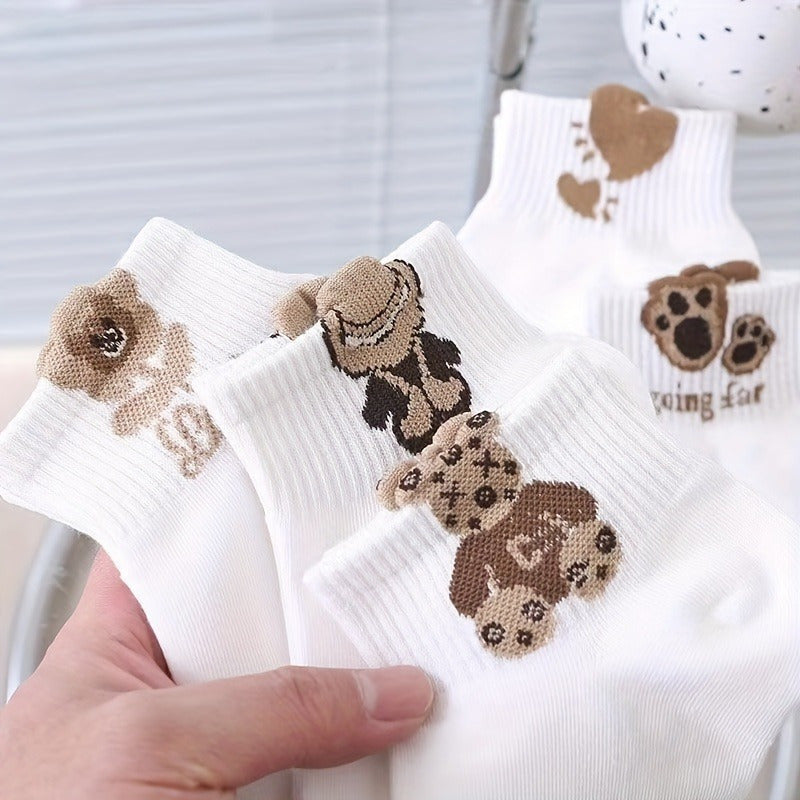 5 pairs of women's cute cartoon teddy bear short socks in coffee color. Made from breathable polyester blend and are comfortable. Machine washable.