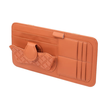 Car sun visor organizer with holders for glasses, cards, and pen.