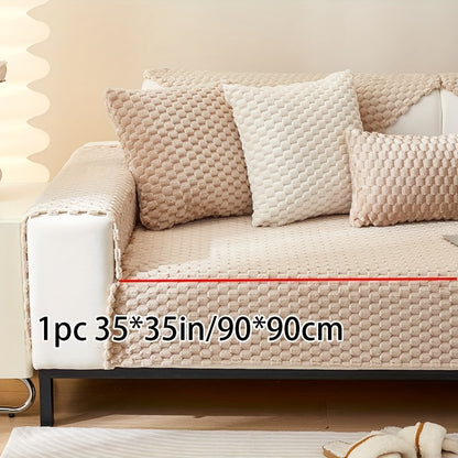 Non-slip sofa cover with honeycomb pattern, ideal for all seasons and protecting furniture in any room.