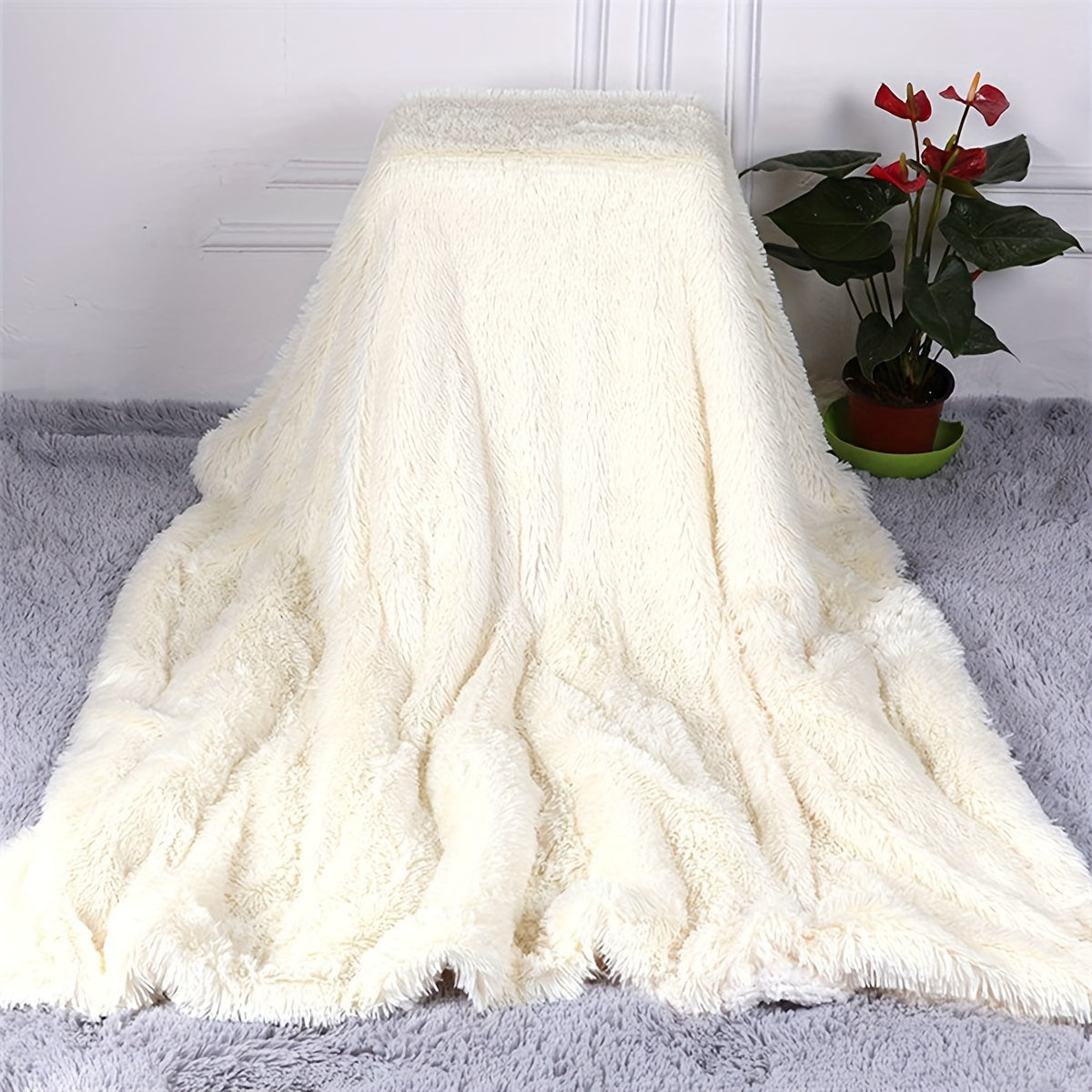 Get cozy with our Vintage Style Long-Hair Shaggy Fleece Throw Blanket. This thick and plush all-season sofa cover provides warmth and comfort in any space. Made from a woven polyester blend, this blanket is machine washable and versatile, perfect for