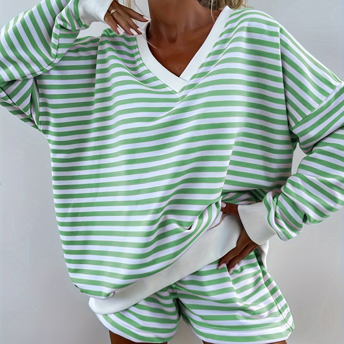 Striped lounge set for women, loose fit with long sleeve top and shorts, perfect for comfy fall wear.