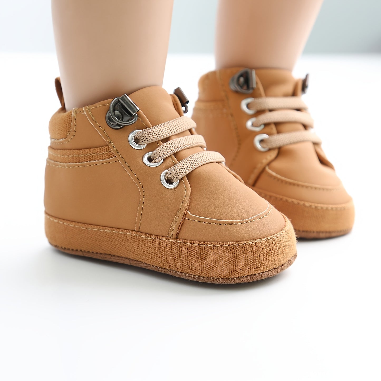 Boots for boys and girls, soft bottom first step shoes, neutral style, for newborns up to 18 months.