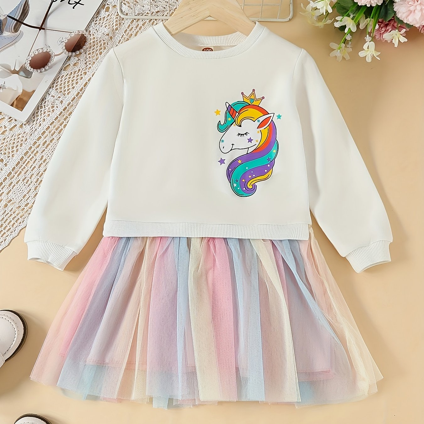 Rainbow tutu dress with unicorn print for girls, perfect for parties or vacations in spring or autumn.