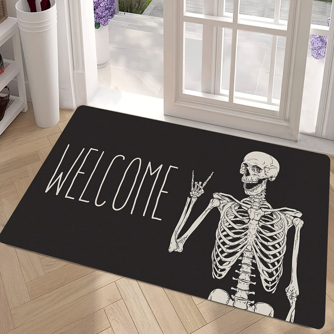 Welcome guests with this Halloween-themed Skull Doormat, designed for both indoor and outdoor use. This non-slip rug is easy to clean, stain-resistant, and low pile for safe and convenient use. Made of polyester and weighing under 700g/m², this festive