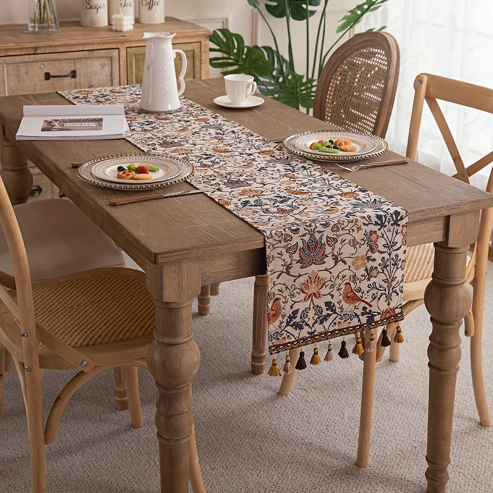 Vintage floral and bird jacquard table runner with tassels in rustic countryside style. Made of polyester, 33cm wide. Ideal for dining, coffee, and tea tables. Vintage design with polyester fabric.