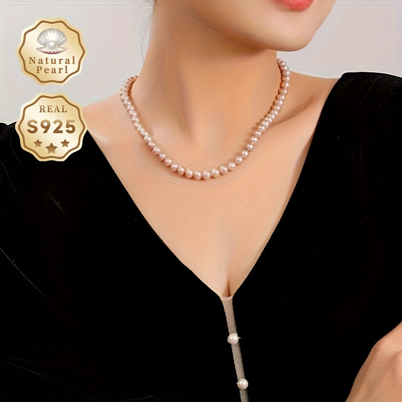 This luxurious and elegant freshwater pearl necklace is designed for women with a June birthstone. It features a S925 silver clasp and a 7-7.5mm strand of purple natural pearls. The necklace comes in a gift box and is perfect for daily wear or special