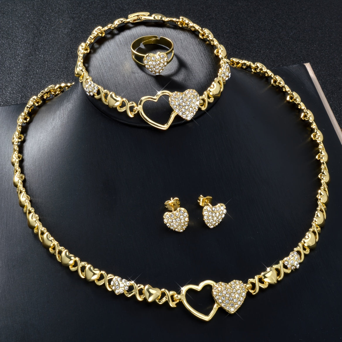 A stylish jewelry set including a dazzling zirconia necklace, bracelet, earrings, and ring, perfect for daily wear or holiday parties. This cute and elegant set makes a great gift for any woman in your life.