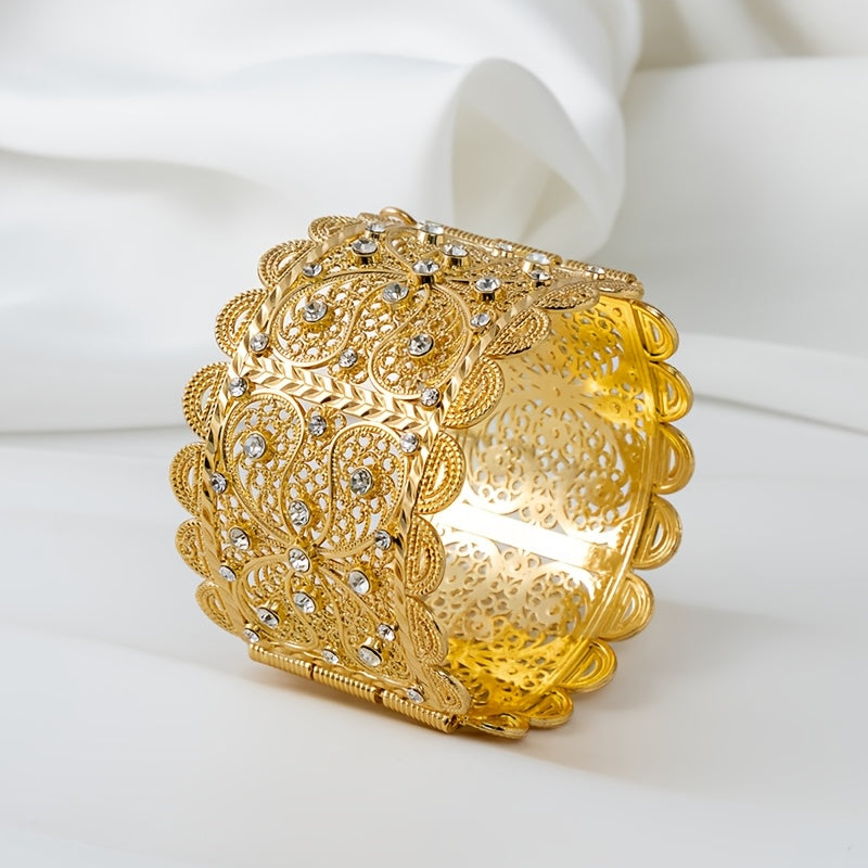 Exquisite Vintage Style Zinc Alloy Cuff Bracelet with Hollow Floral Engraving in Luxurious Golden-Tone, Ideal for Weddings and Parties.