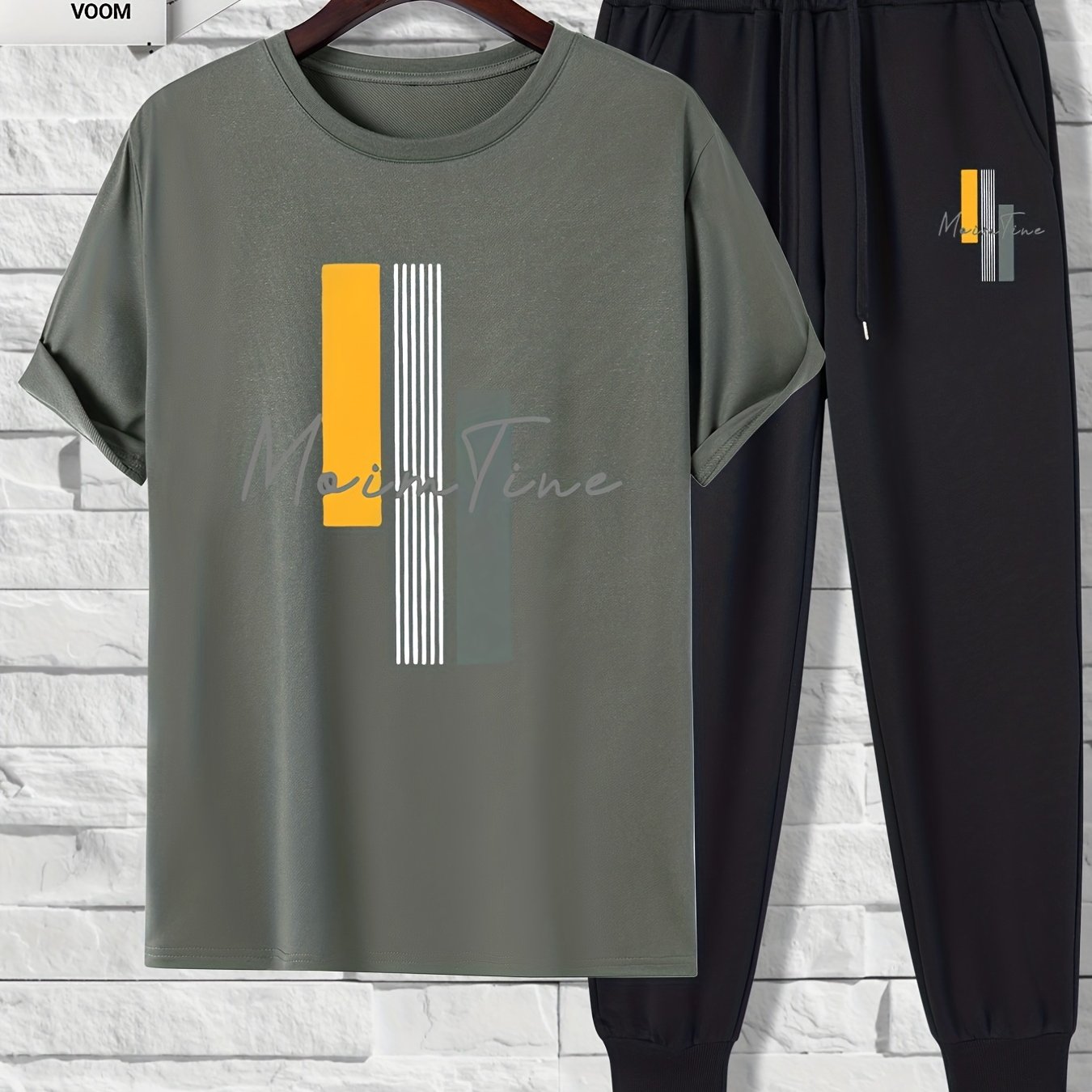 Men's 2-piece outfit with color block print, includes short sleeve t-shirt and drawstring trousers.