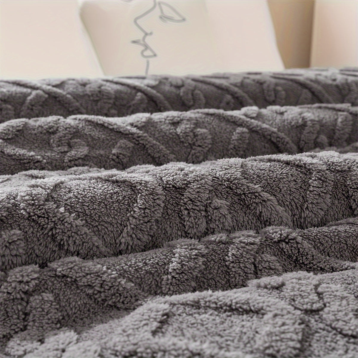 A cozy and versatile blanket with a sweater-like embossed design, perfect for New Year's, Chinese New Year, Valentine's Day, Mother's Day, and back-to-school occasions.