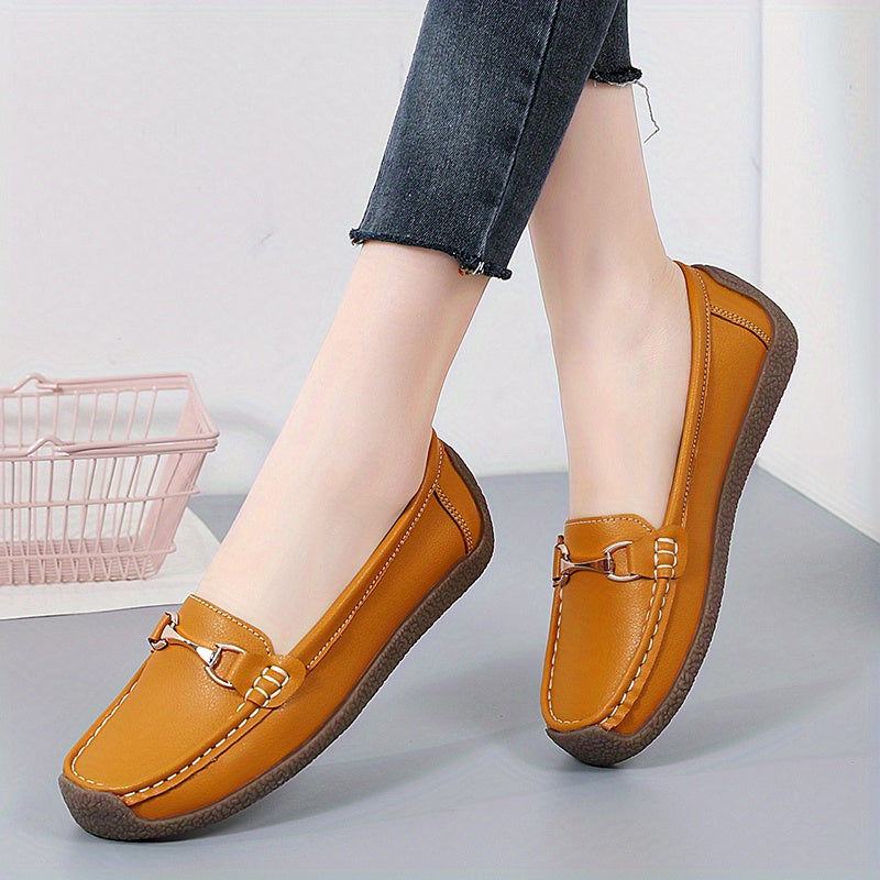 Women's metal decor slip on loafers for casual walking with non-slip flat soles.