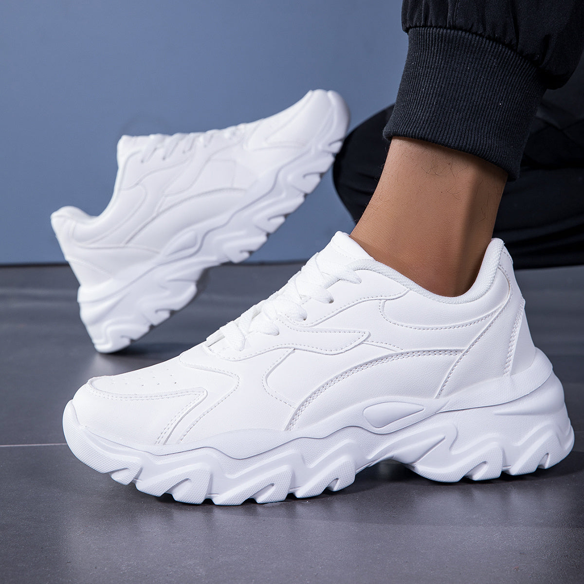 Men's White Chunky Sneakers with low top lace-up design, PU upper, fabric inner & insole, EVA sole for running and casual wear, cushioned and trendy, textured fabric shoes.