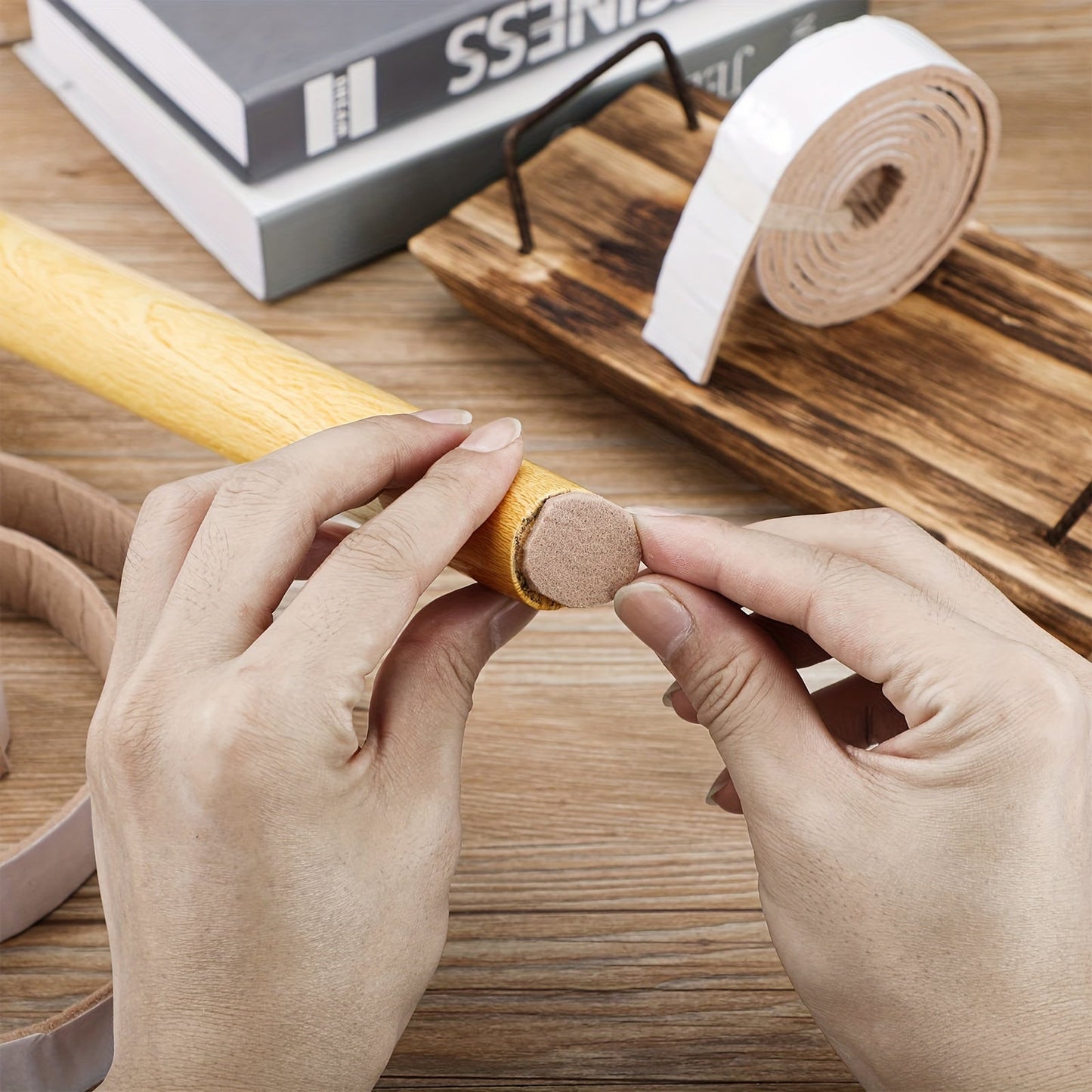 Two rolls of beige self-adhesive felt tape for non-slip furniture protection on hardwood floors, chairs, and walls. Each roll is 3.05 meters long, 2.54 cm wide, and 0.3 cm thick. Great for protecting your surfaces from scratches and damage.