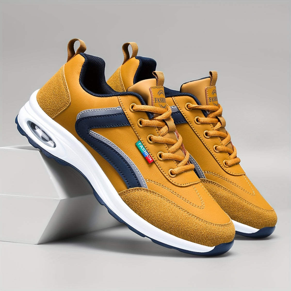 Men's two-tone road running shoes with air cushioning, durable rubber sole, fabric lining, lace-up closure, and low-top design for all seasons.