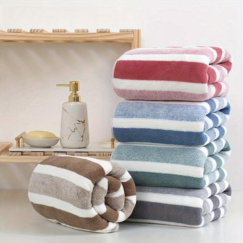 Set of 2 luxurious soft touch bath towels with stripes, highly absorbent and quick-drying for ultimate comfort, suitable for home decor and spa use.