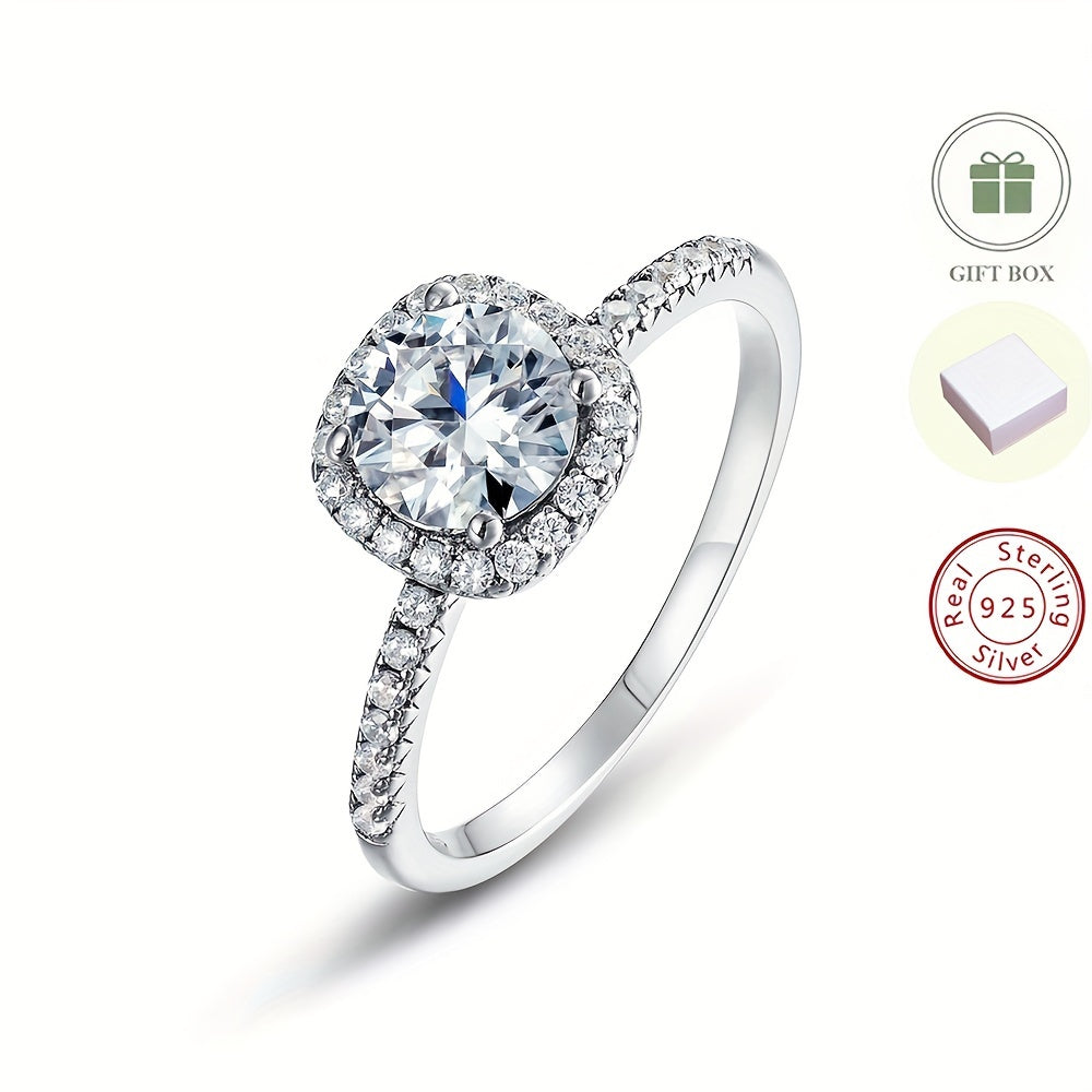 This elegant and atmospheric high-quality sterling silver ring is inlaid with a round 6.5*6.5mm Moissanite stone, weighing 0.98CT. It features a thick silvery white golden electroplating, making it suitable for daily wear, parties, and weddings. This