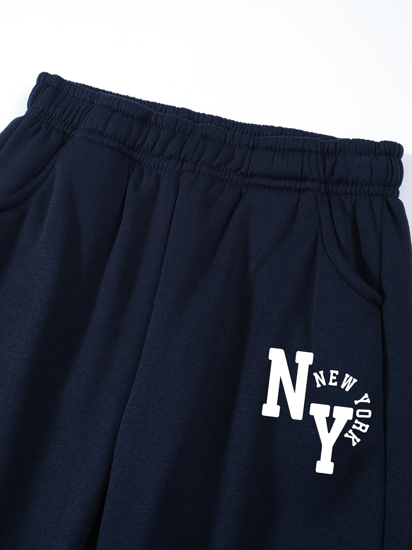 New York letter print hoodie and sweatpants set for kids. Made of casual polyester knit fabric with pockets. Slight stretch and regular fit for boys, girls, teens, and children. Ideal for