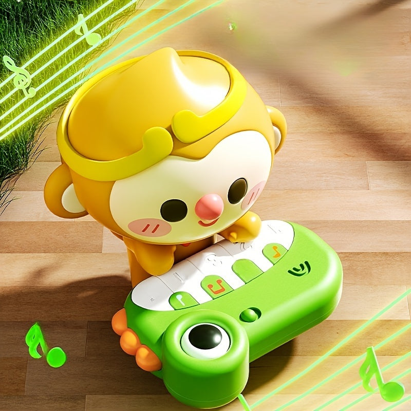 Green ABS plastic educational toy for kids featuring a detachable piano, interactive monkey character, and colorful display. Enhances cognitive development and promotes creative play.