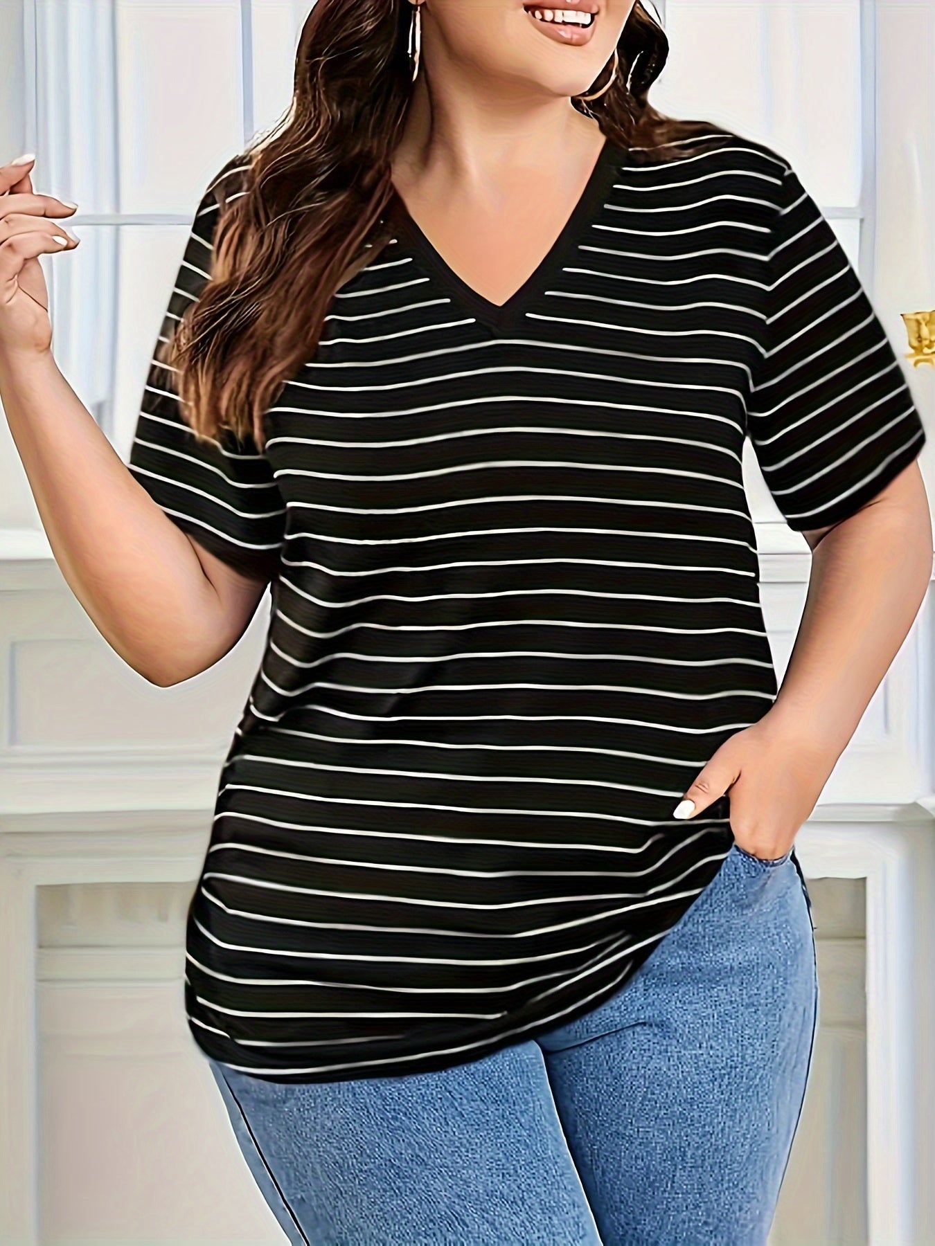 Versatile striped V-neck t-shirt for plus size women, perfect for summer and spring.