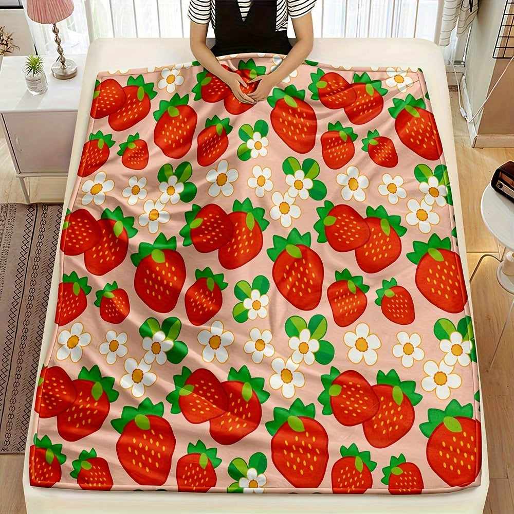 One piece of a cozy, all-season microfiber throw blanket in a rustic style, featuring a charming strawberry and flower pattern. This woven fruit-themed gift blanket is perfect for women.