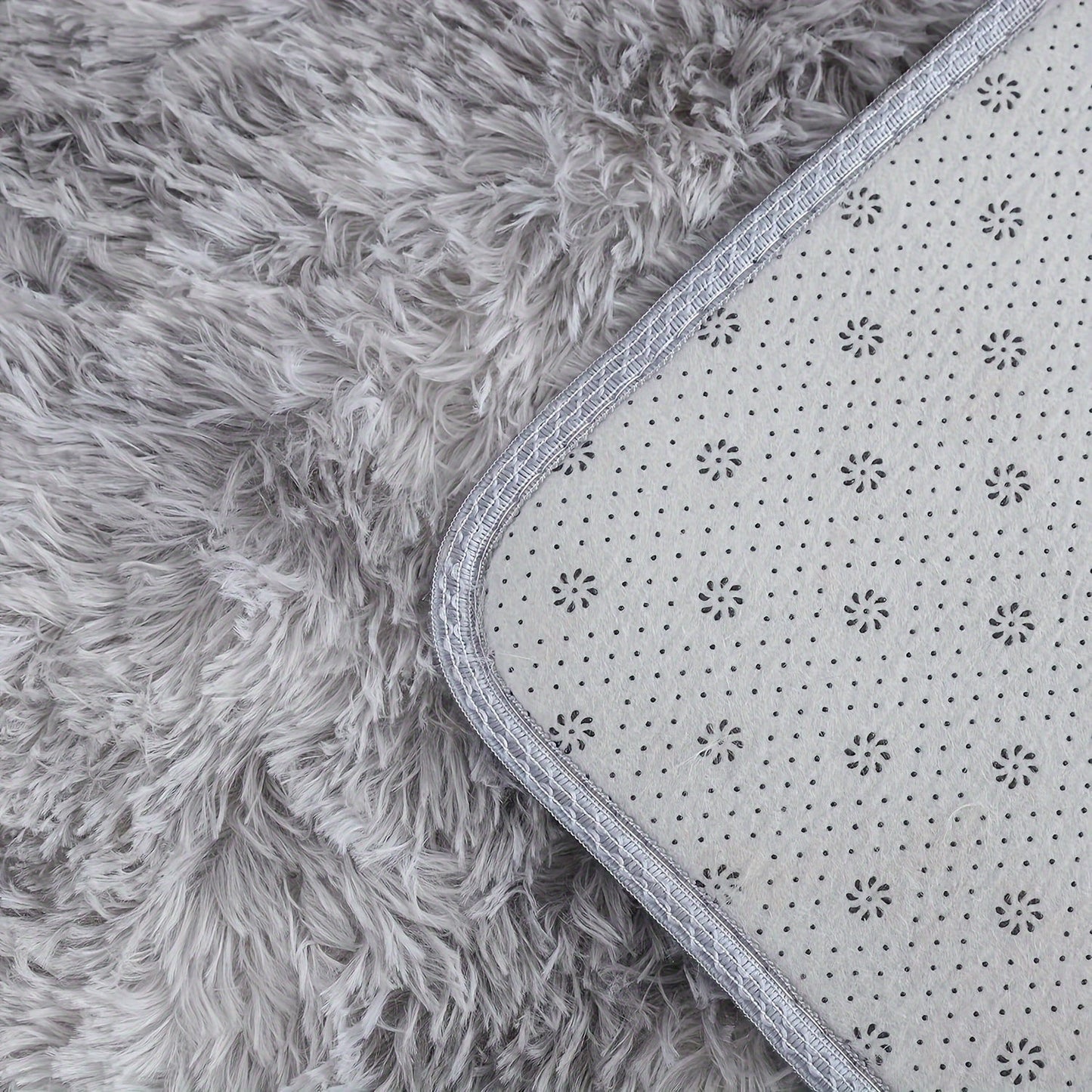 Round area rug made of ultra-soft plush material that is cute, fluffy, and non-slip. Perfect for use in the living room, bedroom, nursery, playroom, or dorm. Made of waterproof polyester fiber for added durability.