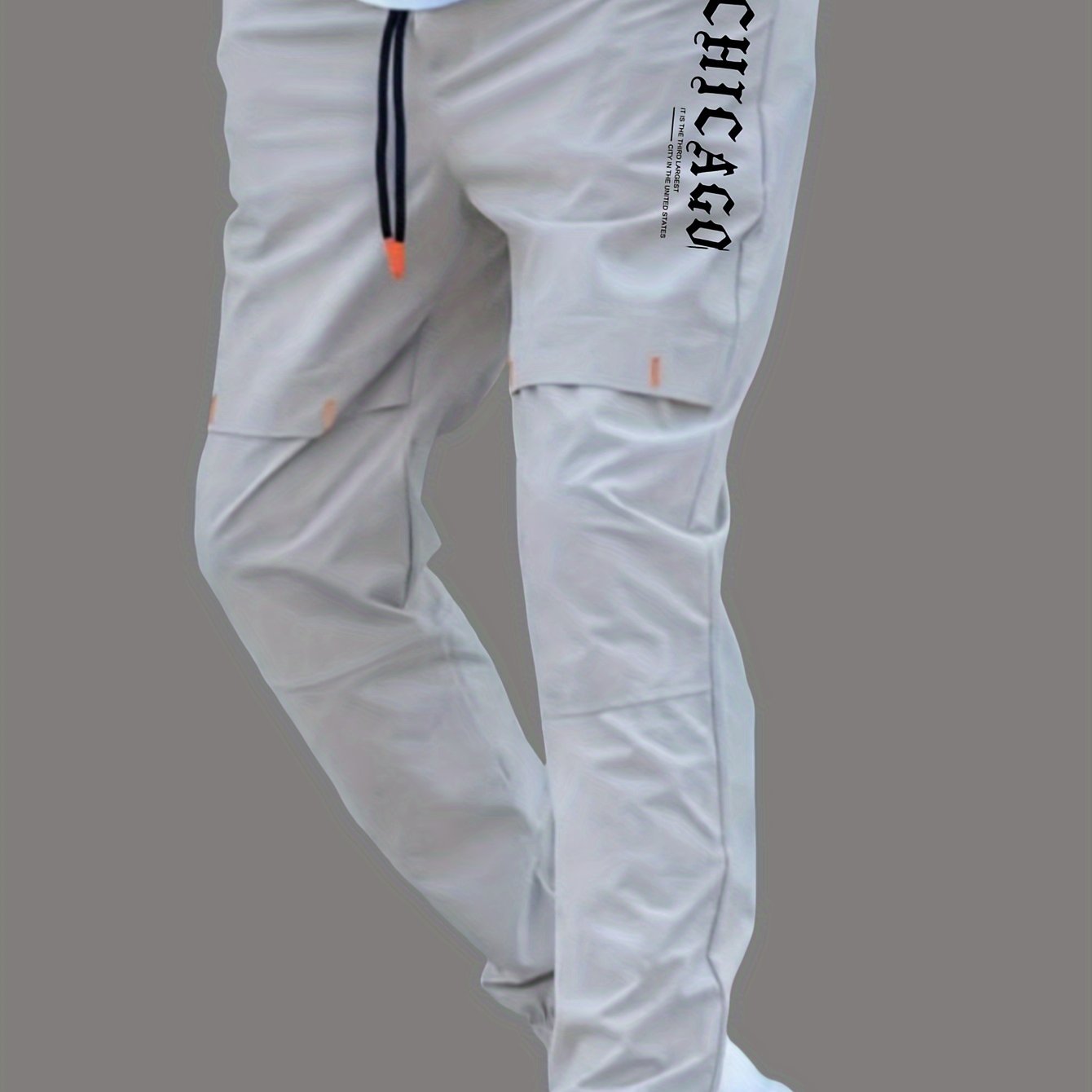 Men's casual joggers made of 100% polyester non-stretch woven fabric with alphabet print detail, suitable for all seasons and featuring a regular fit.