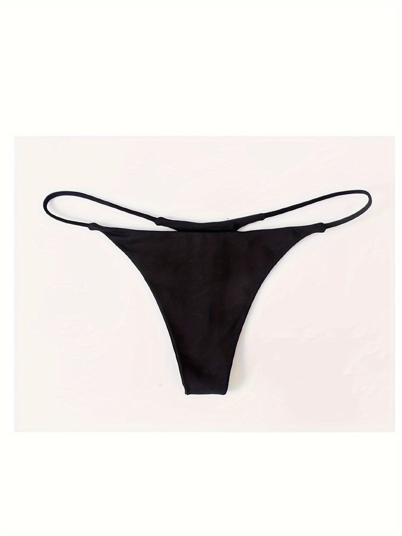 Polyester thong panties for women with double spaghetti straps, low waist, knit fabric, drop waist, and one size fitting S/M/L, weighing 90gsm.