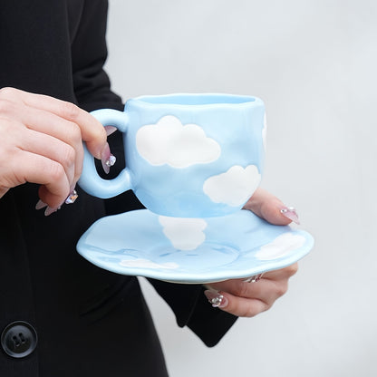 Cloud-shaped ceramic coffee mug with saucer - reusable, handwash only, ideal for breakfast & office use - great gift idea.