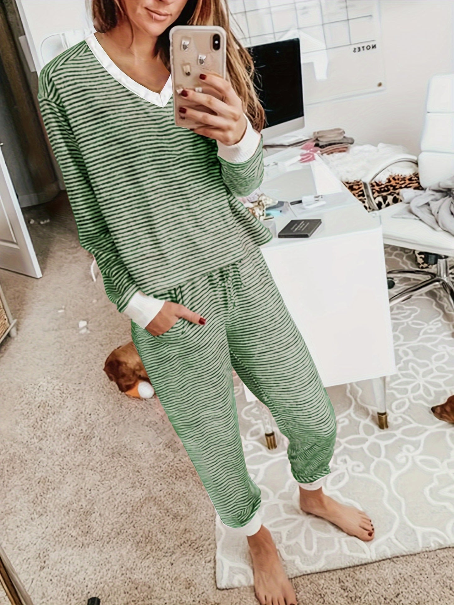 Striped V-neck knit loungewear set with long sleeves and pants.