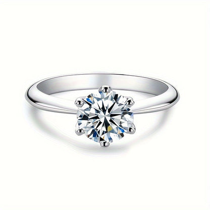 This stunning Classic Six-Prong Moissanite Promise Ring is available in 1, 2, 3, or 5 carat options. Crafted from 925 sterling silver and plated with 18k gold, this high-quality jewelry piece is perfect for engagements or marriages. It is a truly special