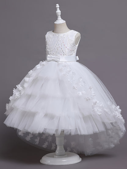 Elegant sleeveless princess dress with flowing tail, lace, and floral embellishments. Perfect for pageants, weddings, piano performances, and birthday parties. Made with tweedlike texture