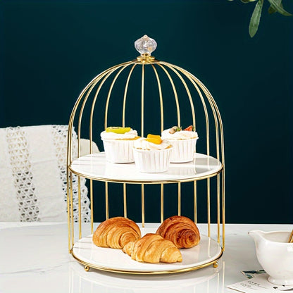 Golden cast iron birdcage cake stand for elegant dessert display in living room, perfect for snacks, fruit, and sweets.