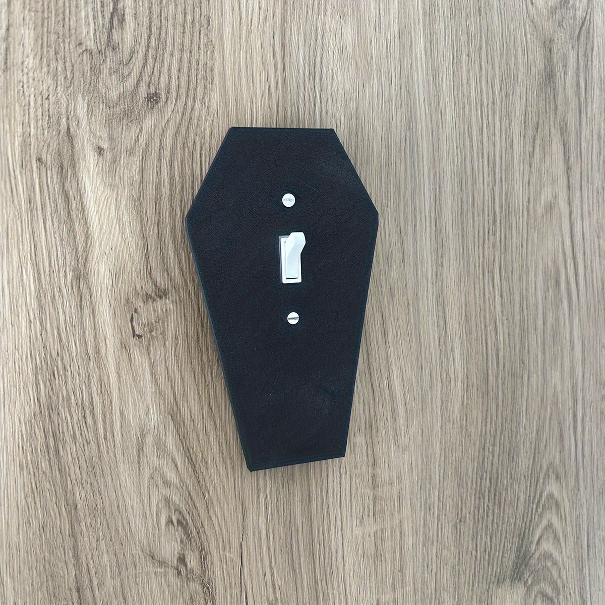 3D printed Gothic Coffin Wall Plate Cover for light switch, easy screw-in installation, no electricity needed. Perfect for Halloween or home décor.