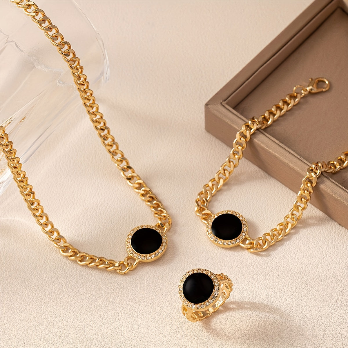 A collection of sleek and stylish black circular jewelry, including a necklace, ring, bracelet, and matching three-piece set.