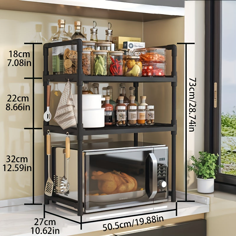 A modern kitchen storage shelf with stainless steel microwave stand and double layer, multi-layer oven rack organizer. Made with metal and plastic materials, this contemporary all-in-one piece is perfect for the dining room and requires no assembly.