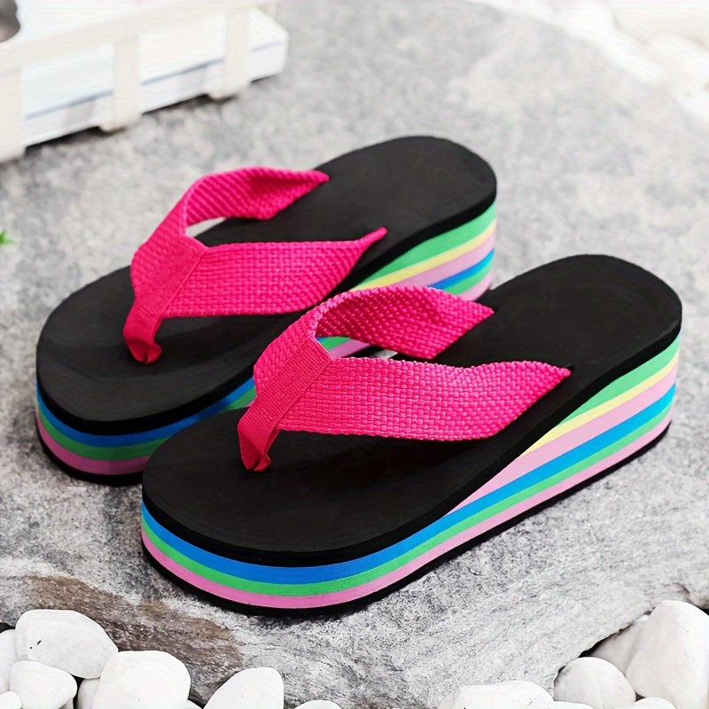 Summer clog flip flops with high heels and rainbow sole for seaside vacation.