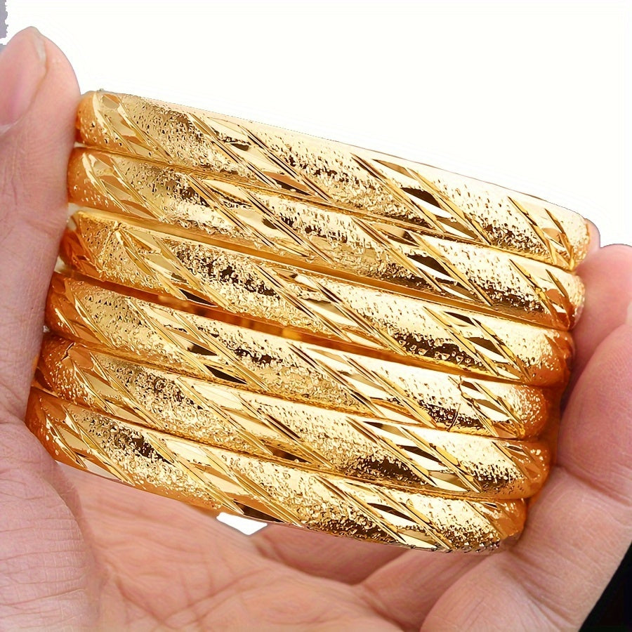 Set of 6 Middle Eastern style bangle bracelets, plated with 18K gold. This classical set is perfect for weddings, parties, and everyday wear for women.