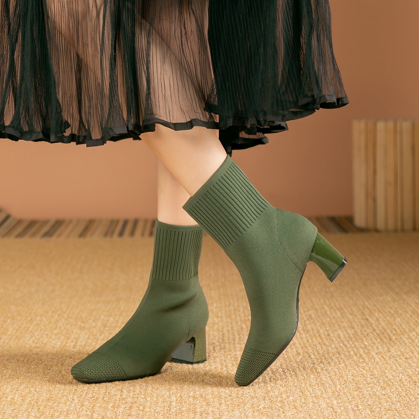 Women's square toe sock boots with high heel, solid color knit design, stretchy slip on style.