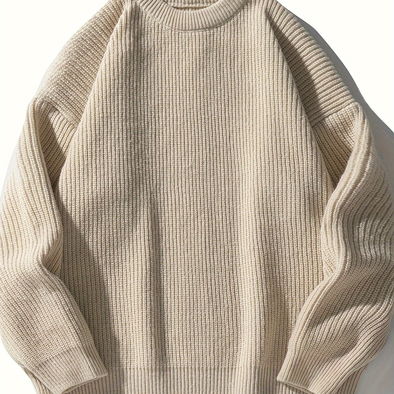 Casual men's sweater with loose fit ribbed knit and round neck for fall/winter wear.