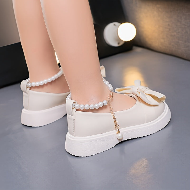 Stylish Mary Jane flats for girls feature pearl and bow accents, perfect for parties and casual wear in spring and fall.