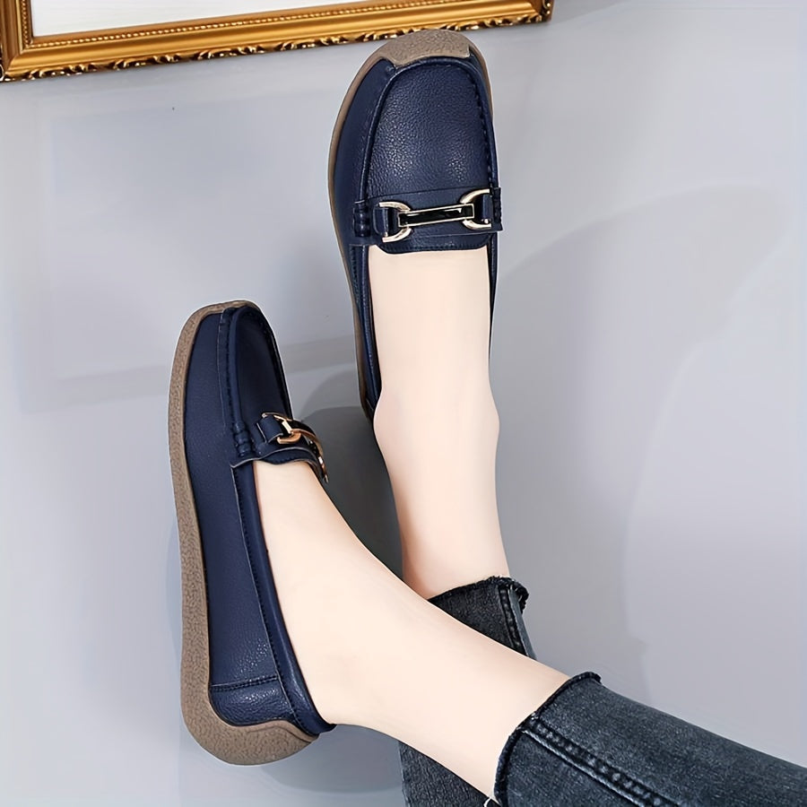 Women's slip-on flats with solid color, plain toe, and non-washable man-made materials.