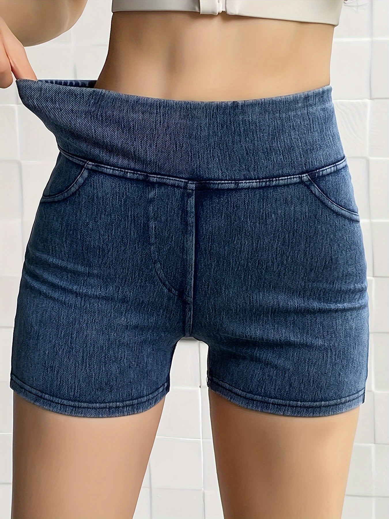 High waisted denim shorts that lift the booty and have a casual, skinny jean style.