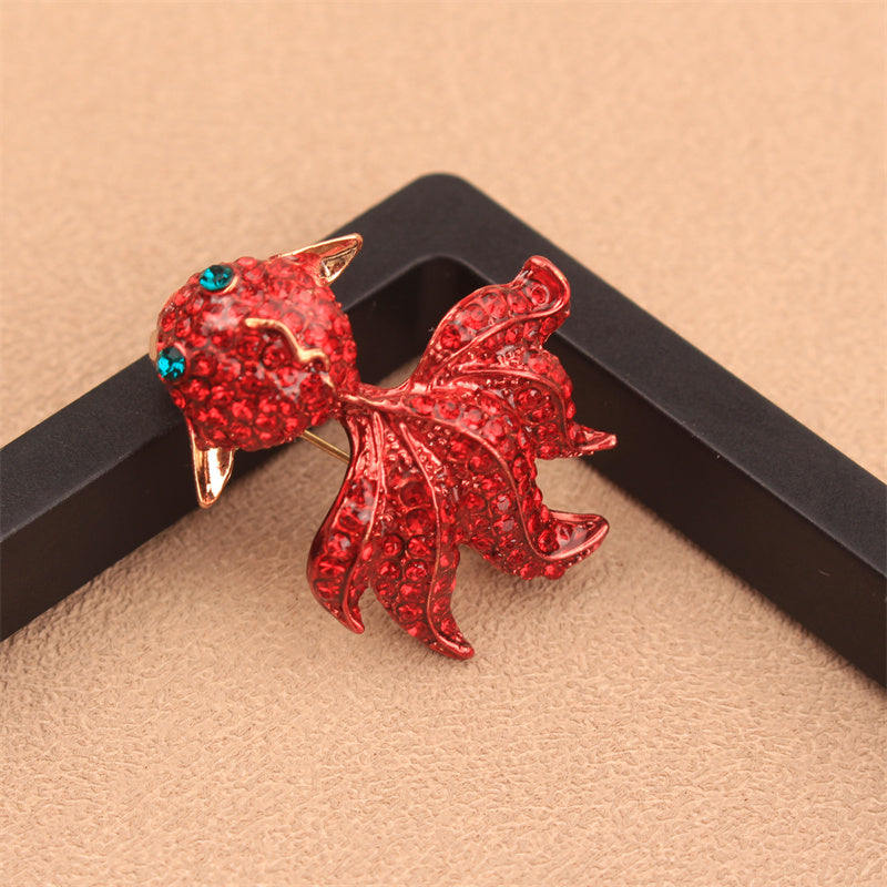 Stylish Fish Brooch with Rhinestones - A Versatile and Chic Addition for Clothes, Purses, and Hats