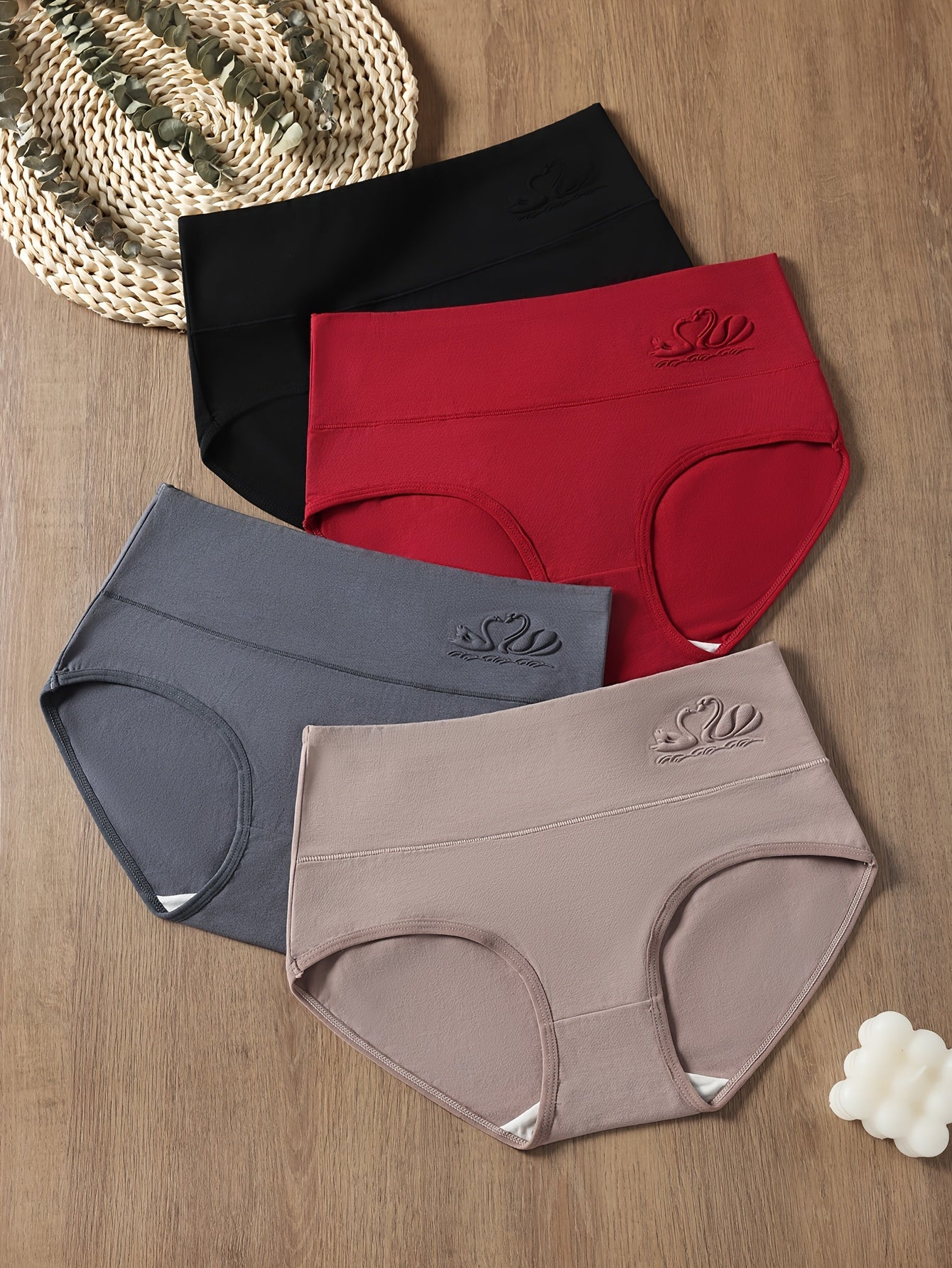 4 high-waisted briefs for women in sexy solid colors. Made with 95% elastane knit fabric for a comfortable fit.