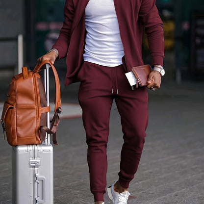 Men's travel-friendly sporty tracksuit set with long sleeve zip-up jacket and joggers, perfect for leisure and outdoor activities. Made of polyester.