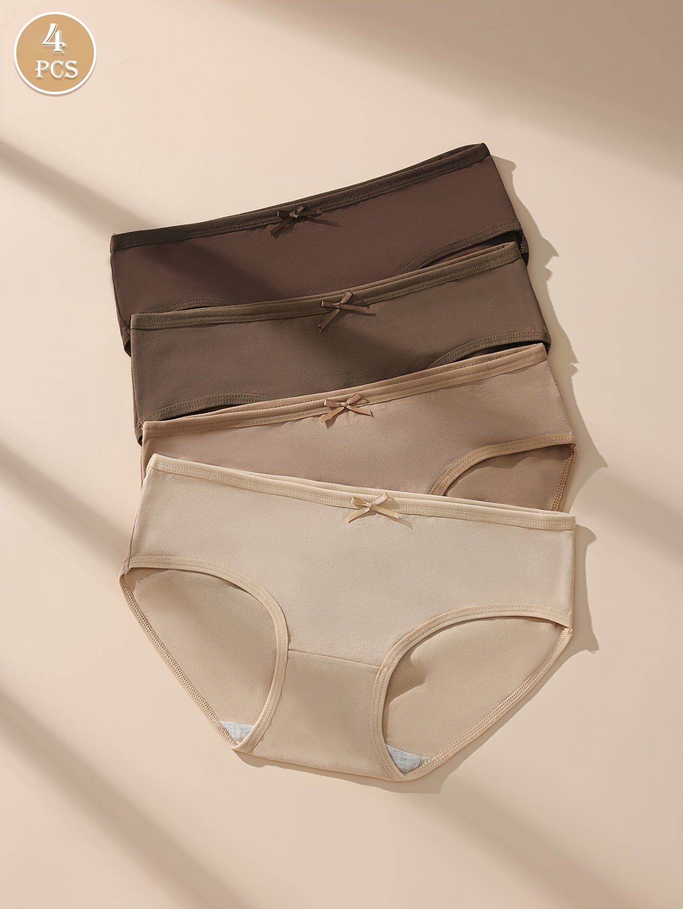 4 Maillard Color briefs for women in beige, brown, and nude shades. Sexy, comfortable, and breathable with bow detail and stretchy, non-see-through fit.