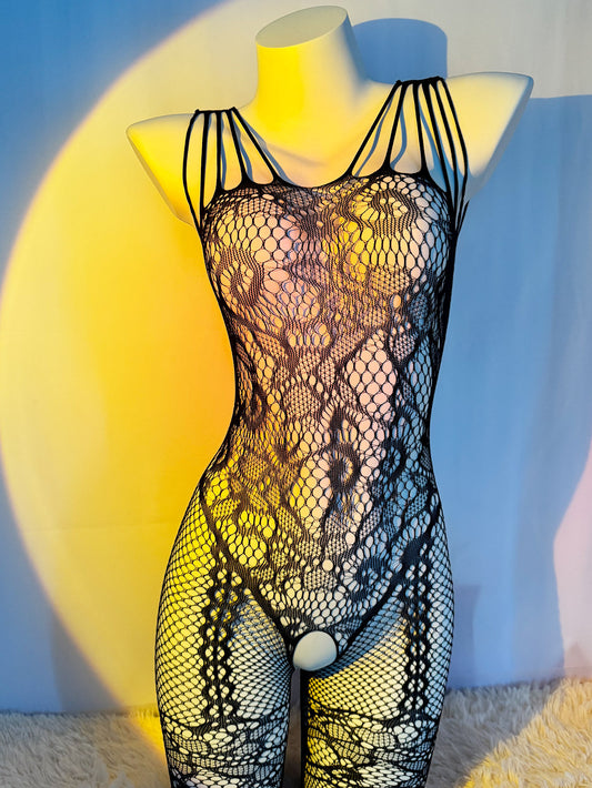 Seductive fishnet bodysuit with jacquard sleeves, crotchless design, and garter socks. Perfect Valentine's Day gift with high quality, comfortable, and stretchy fabric that fits just right.